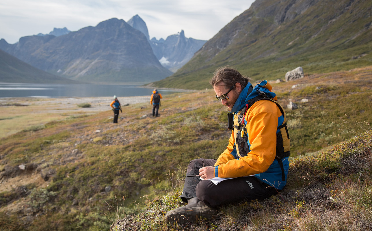 Expeditions Leader sitting down