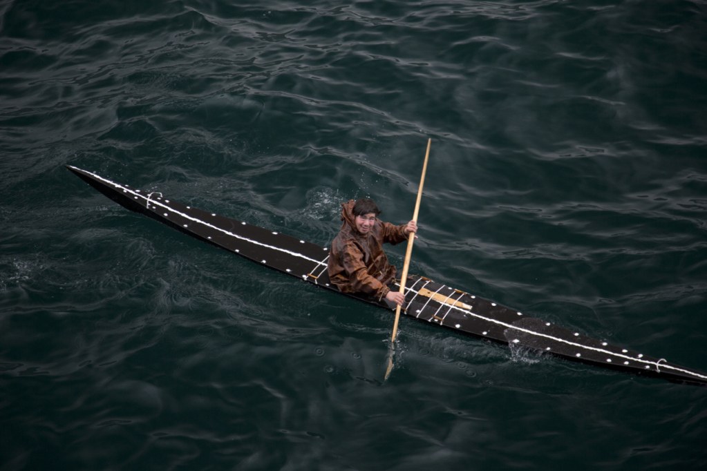 Enjoy a traditional kayaking demonstration on your Greenland expedition.