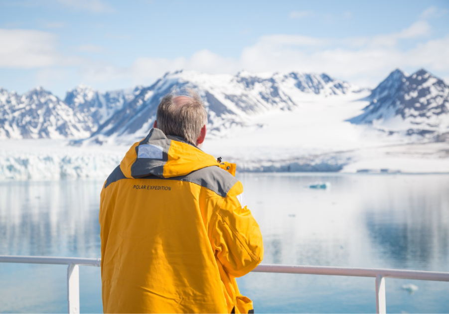 Guest admiring Lilliehöök Glacier from ship. Photo by Acacia Johnson. 