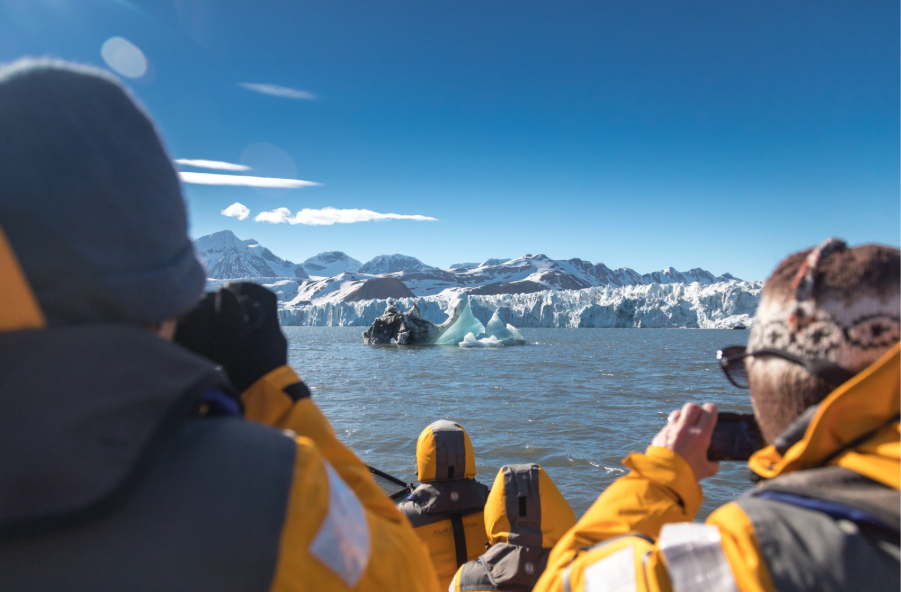 Guests taking photos of Isbukta glacier. Photo by Acacia Johnson. 