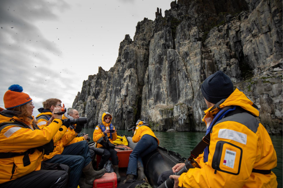Guests Zodiac Cruising in Alkefjellet, Svalbard. Photo by Michelle Sole. 