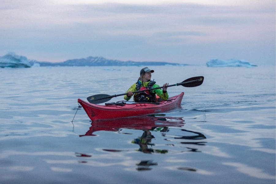 Close-up of guest kayaking in Greenland. 