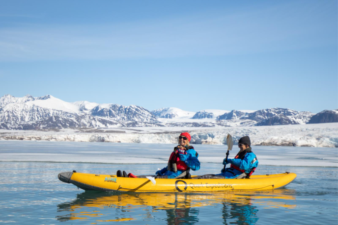 Guests paddling in Svalbard waters. Photo by Michelle Sole. 